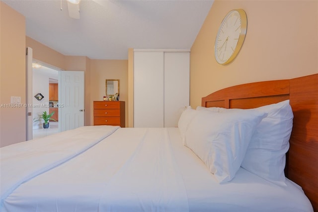 2888 S Carambola Cir S Unit 2079, Coconut Creek, FL 33066 - bedroom with a closet and ceiling fan