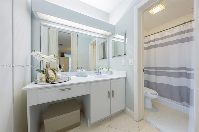 2888 S Carambola Cir S Unit 2079, Coconut Creek, FL 33066 - full bathroom featuring vanity, tile patterned floors, and a shower with curtain