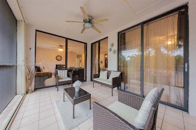 2888 S Carambola Cir S Unit 2079, Coconut Creek, FL 33066 - sunroom / solarium featuring ceiling fan and an outdoor hangout area