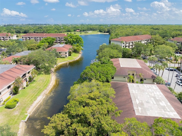 2888 S Carambola Cir S Unit 2079, Coconut Creek, FL 33066 - bird's eye view of a large body of water and a tree filled landscape