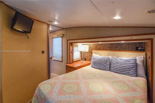 bedroom featuring recessed lighting and vaulted ceiling