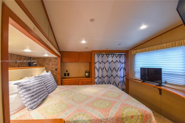 bedroom with recessed lighting and lofted ceiling