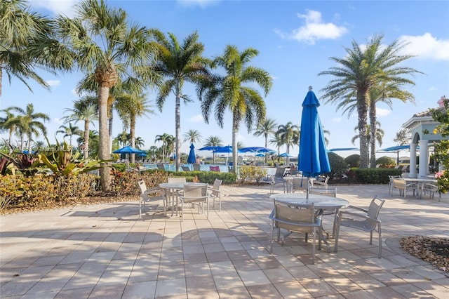 surrounding community featuring a patio area