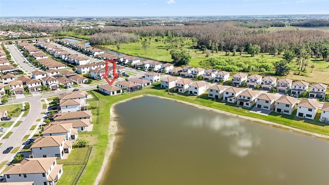 aerial view featuring a residential view and a water view