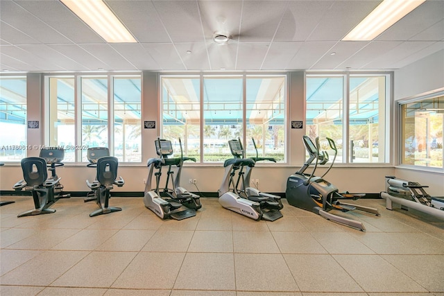 workout area featuring baseboards