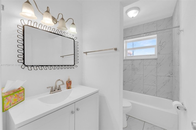 full bathroom featuring marble finish floor, toilet, vanity, and  shower combination