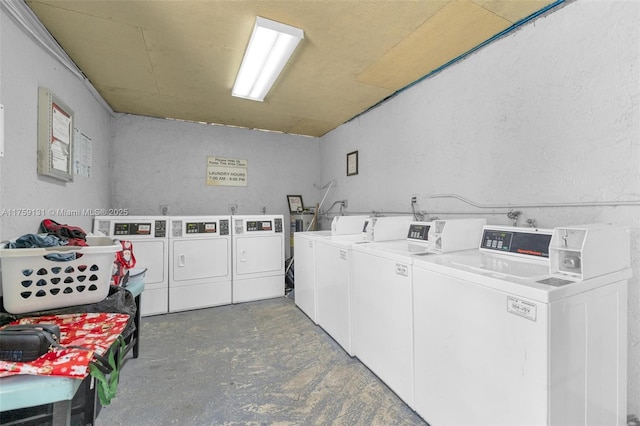 shared laundry area featuring washer and clothes dryer