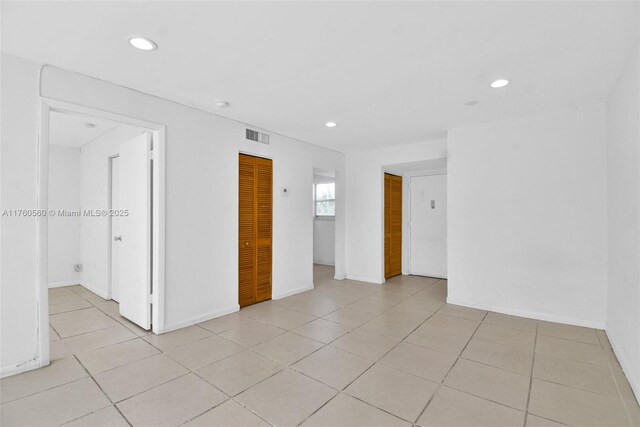 618 Euclid Ave Unit 303, Miami Beach, FL 33139 - unfurnished room with recessed lighting, light tile patterned flooring, and a smoke detector