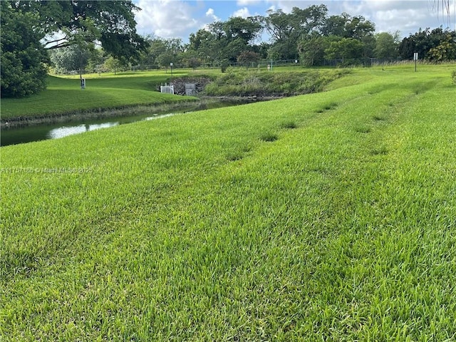 view of yard featuring a water view