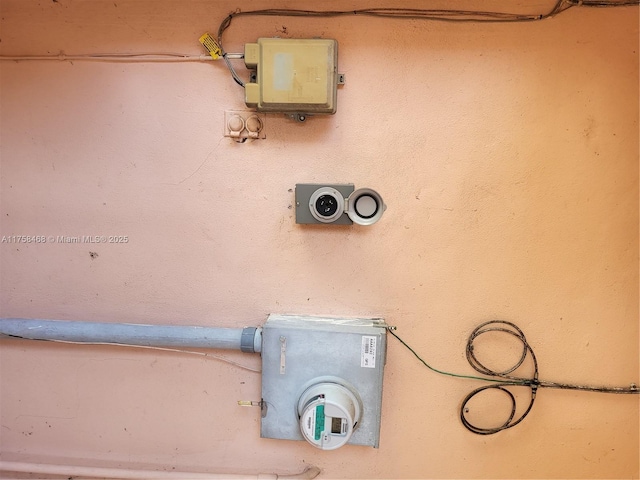 exterior details featuring electric meter