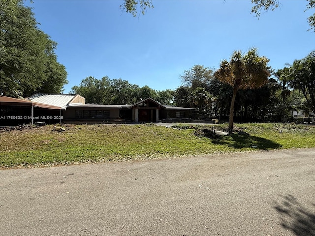 view of front of home with a front yard