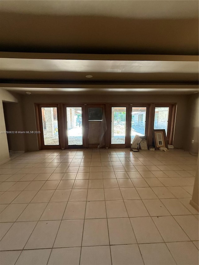 empty room featuring light tile patterned flooring