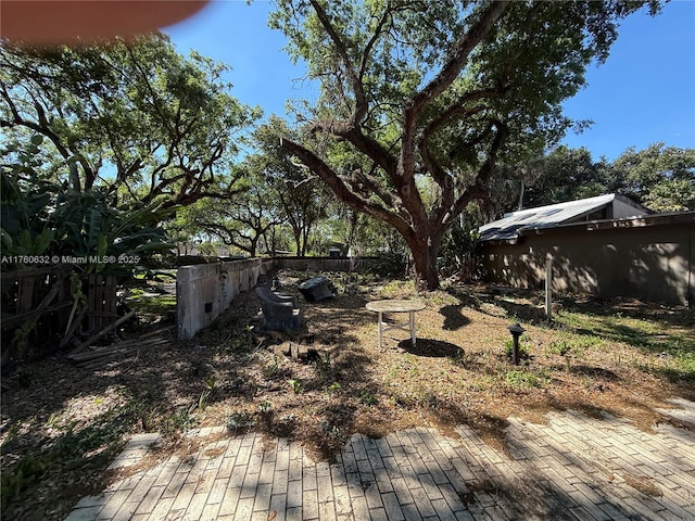 view of yard with fence