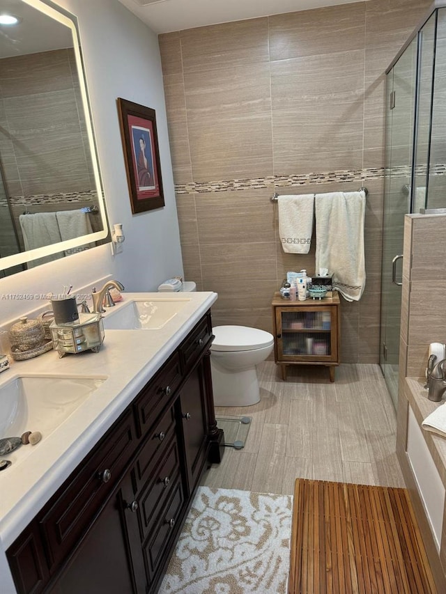 1838 NW 93rd Ter, Plantation, FL 33322 - full bathroom featuring a shower stall, tile walls, and a sink