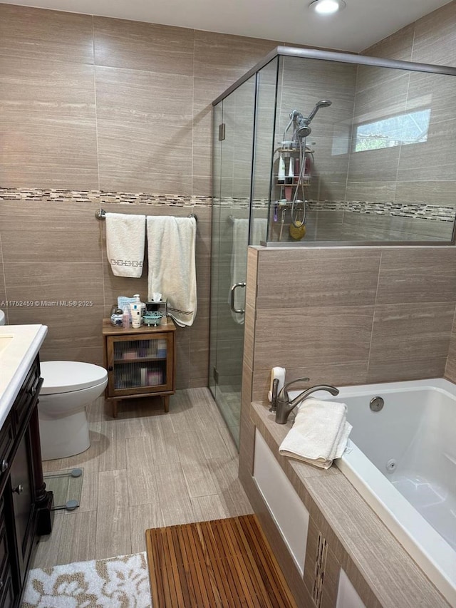 1838 NW 93rd Ter, Plantation, FL 33322 - bathroom featuring tile walls, a jetted tub, a stall shower, and vanity