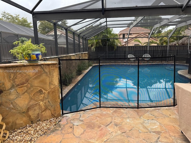 1838 NW 93rd Ter, Plantation, FL 33322 - view of swimming pool featuring fence, a patio area, and a lanai