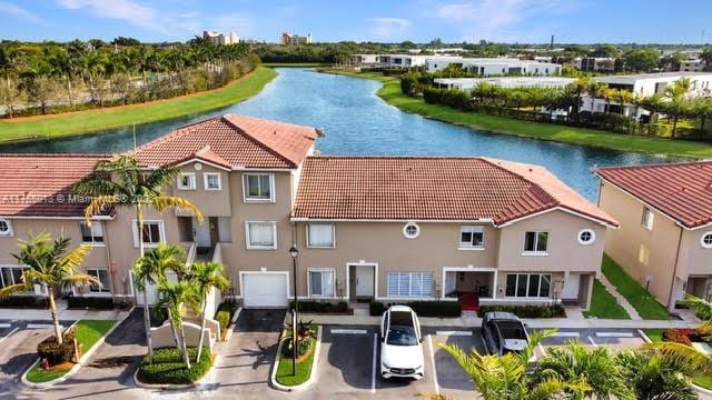 bird's eye view with a water view