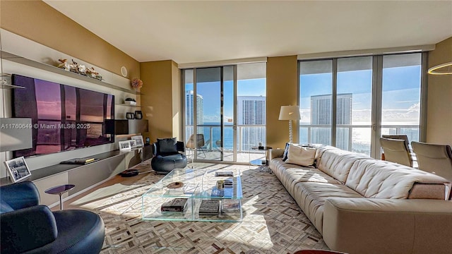 living area featuring a healthy amount of sunlight and expansive windows