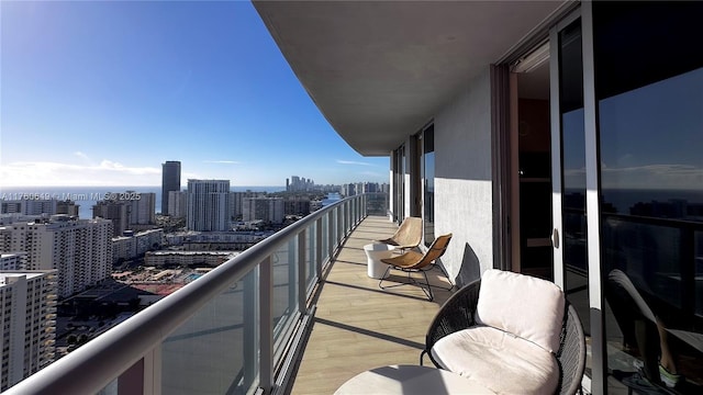 balcony featuring a view of city