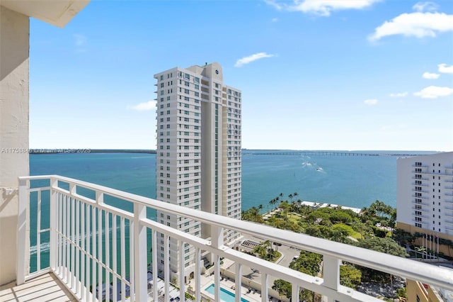 balcony featuring a water view