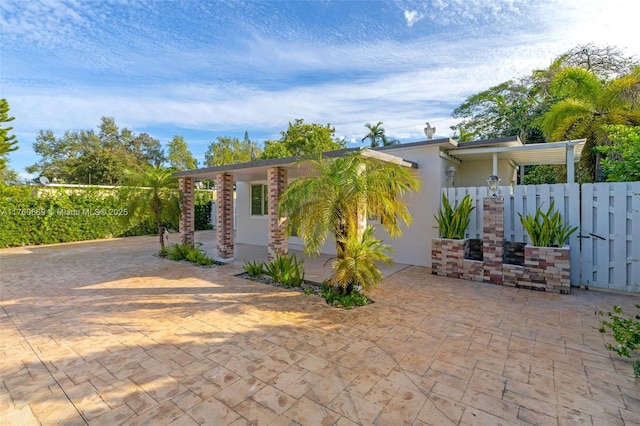 exterior space with a gate and fence