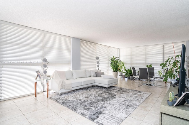 200 Leslie Dr Unit 430, Hallandale Beach, FL 33009 - living area with a textured ceiling and light tile patterned floors