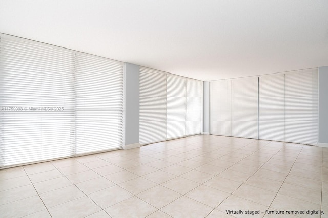 200 Leslie Dr Unit 430, Hallandale Beach, FL 33009 - unfurnished room with light tile patterned flooring