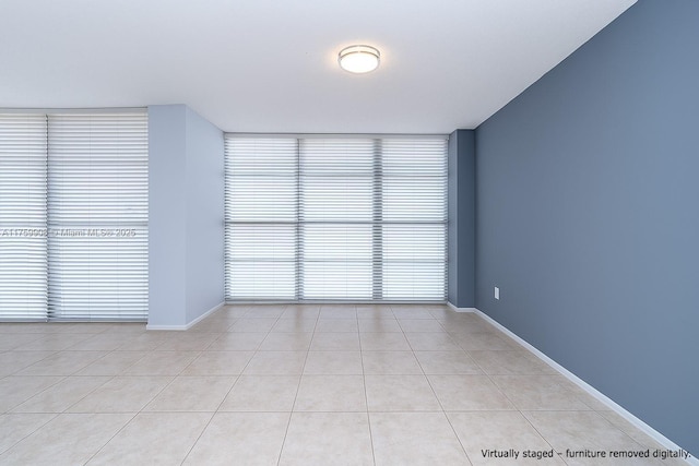 200 Leslie Dr Unit 430, Hallandale Beach, FL 33009 - spare room with light tile patterned floors and baseboards