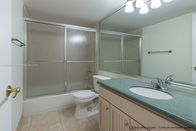200 Leslie Dr Unit 430, Hallandale Beach, FL 33009 - full bathroom with vanity, tile patterned flooring, bath / shower combo with glass door, and toilet