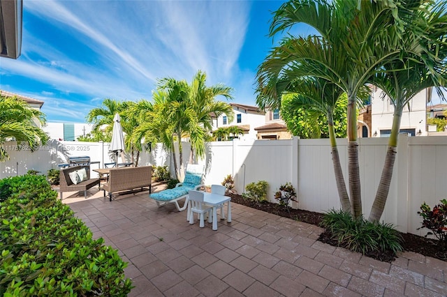 view of patio / terrace featuring a fenced backyard and outdoor dining space