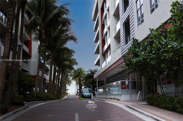 view of street featuring curbs and sidewalks