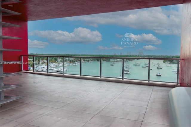 balcony featuring a water view