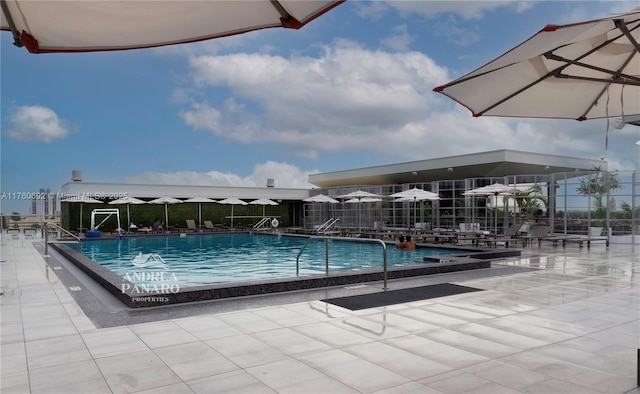 pool with a patio area