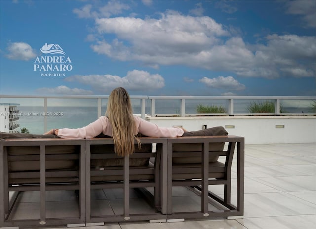 view of patio featuring a water view