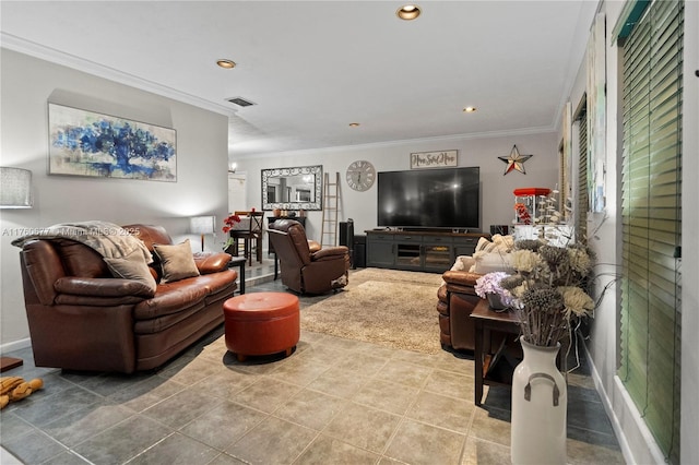 living area featuring recessed lighting, visible vents, ornamental molding, and tile patterned flooring