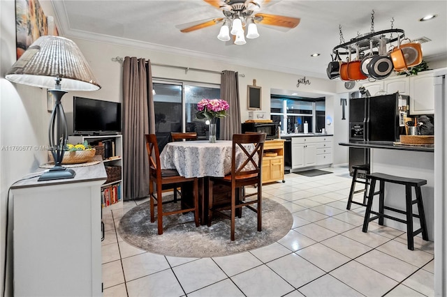 dining room featuring light tile patterned floors, recessed lighting, ornamental molding, and a ceiling fan