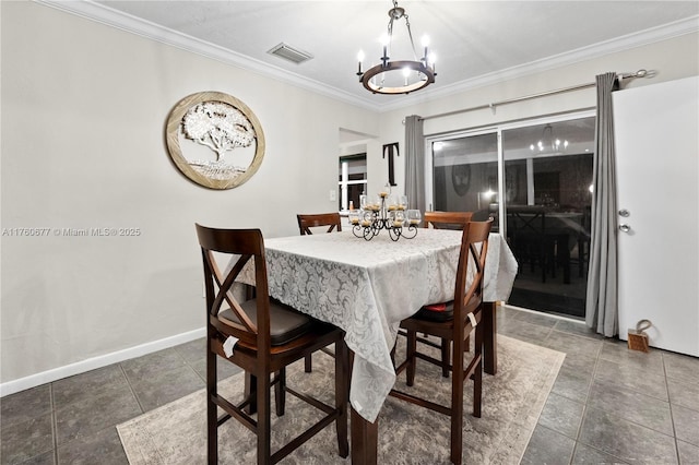 tiled dining area with a notable chandelier, baseboards, visible vents, and ornamental molding