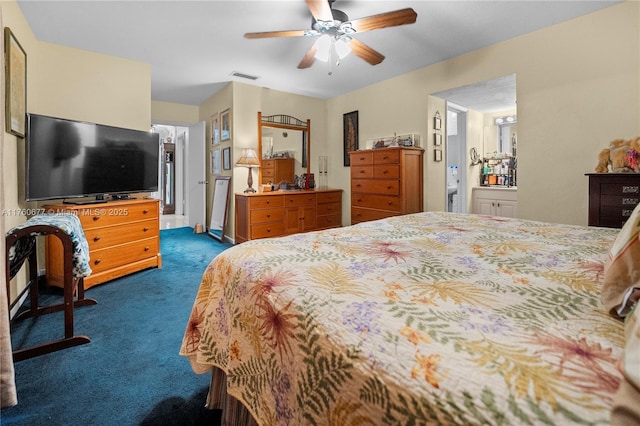 bedroom with a ceiling fan, visible vents, and dark carpet