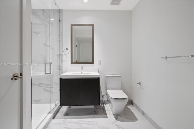 bathroom with visible vents, toilet, marble finish floor, a marble finish shower, and vanity