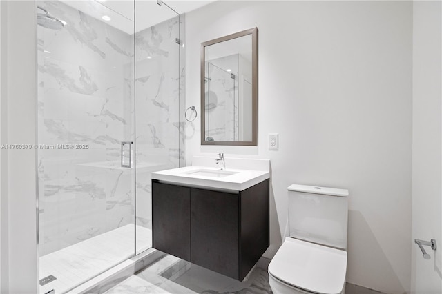 full bathroom featuring vanity, toilet, marble finish floor, and a marble finish shower