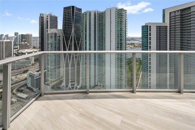 balcony featuring a city view