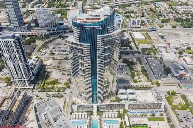 birds eye view of property featuring a city view