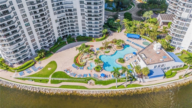 birds eye view of property with a water view