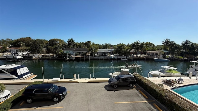 dock area with a water view