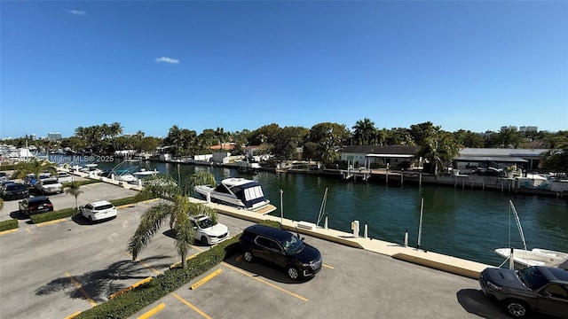 property view of water with a dock