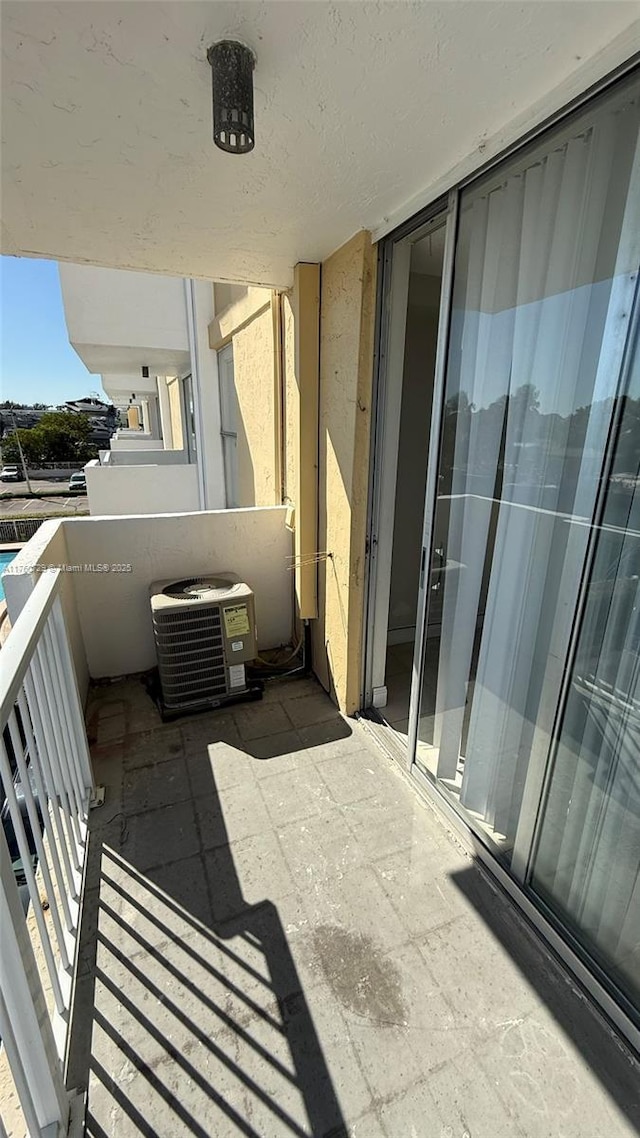 balcony featuring cooling unit