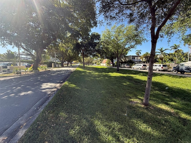 view of road featuring curbs