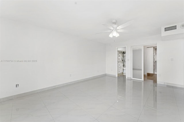 unfurnished bedroom featuring visible vents, ceiling fan, and baseboards