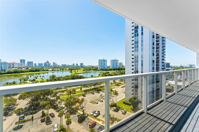 balcony with a view of city and a water view