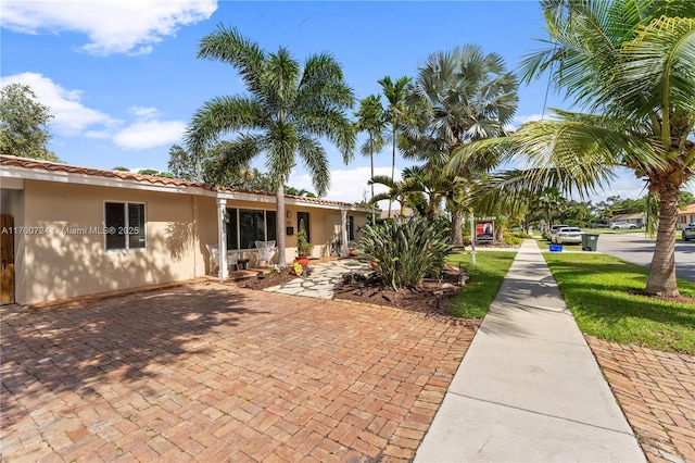 exterior space featuring stucco siding